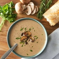 Пазарна кремаста печурка и билка супа, супа од свежа дели, чаша Оз